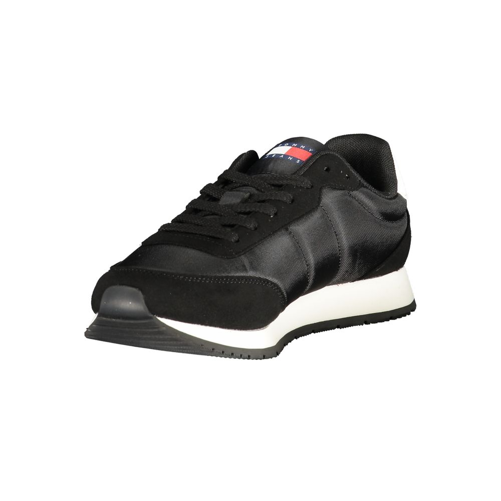 Tommy Hilfiger black polyurethane men's sneaker with white sole and brand logo detail, casual athletic footwear.