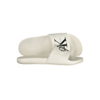 Calvin Klein white polyurethane men's slippers with slip-on design and cushioned sole for comfortable indoor wear.