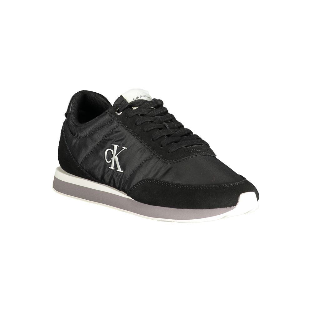 Calvin Klein black polyester men's sneaker with white sole and minimalist design, shown from side view.
