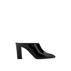 Prada black calfskin mules with pointed toes and low block heels, showcasing sleek and elegant footwear design.