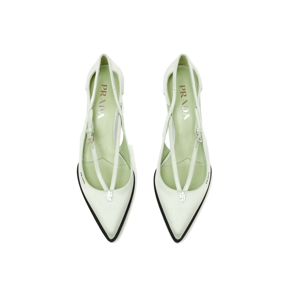 Prada bicolor silk mid heel pumps featuring a sleek design with contrasting colors and elegant detailing.