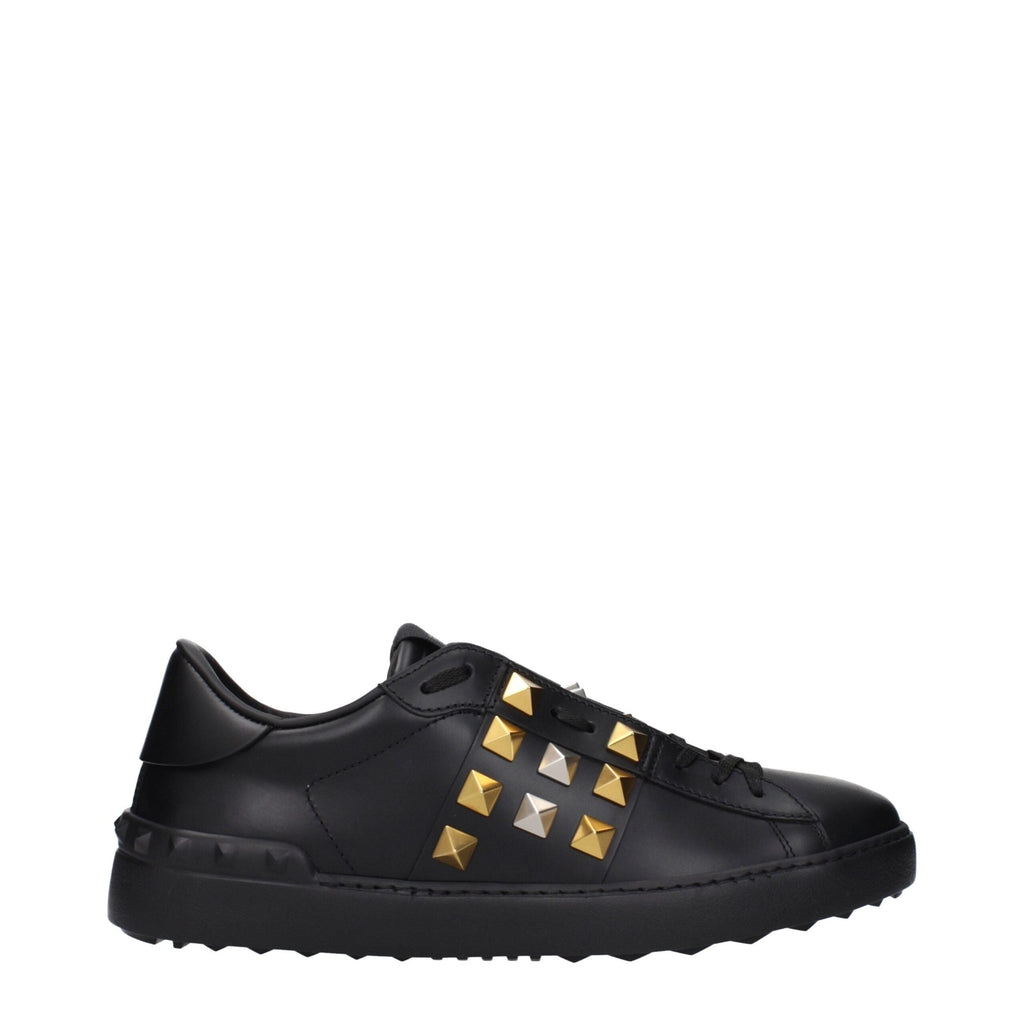 Valentino Garavani black leather sneakers with sleek design and subtle logo accents on white rubber sole.