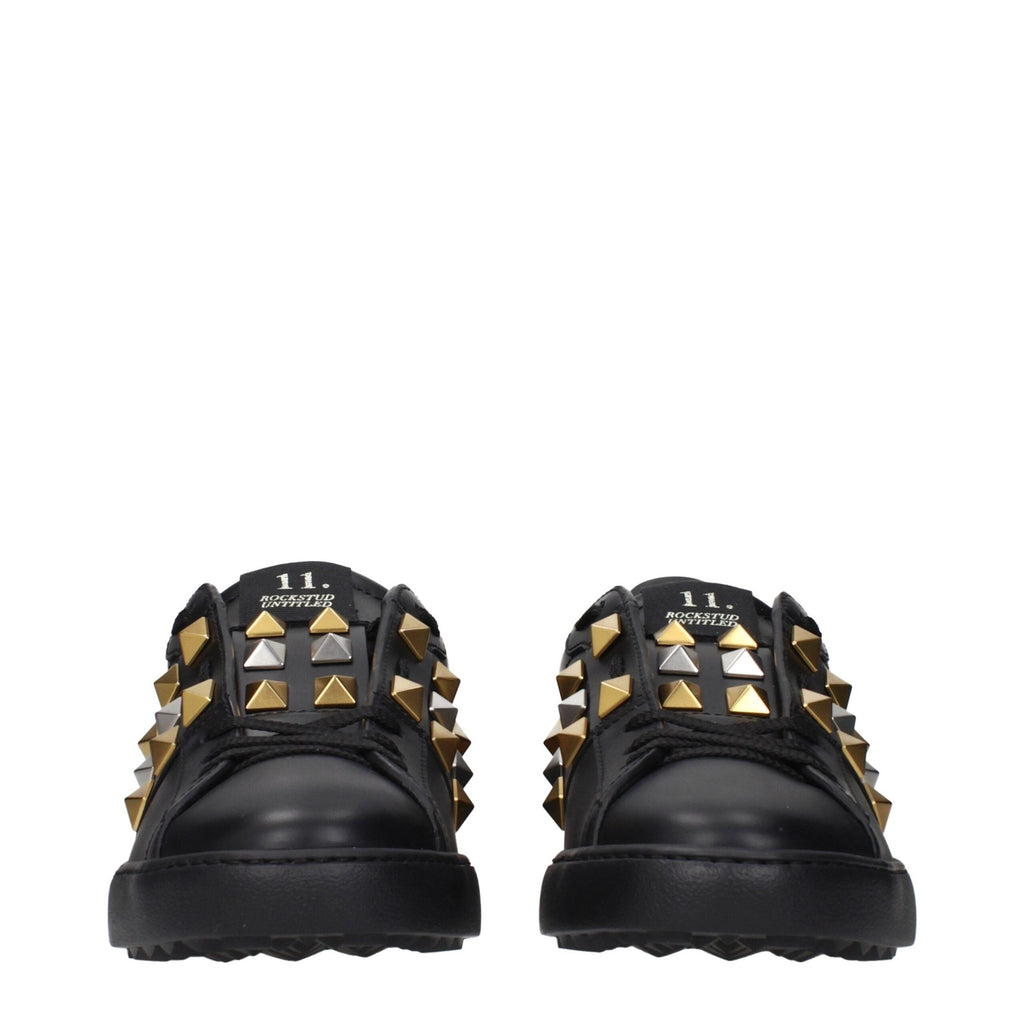 Black leather sneakers by Valentino Garavani featuring sleek design and signature branding, perfect for casual and stylish outfits.