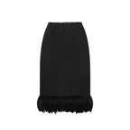 Black silk skirt by Saint Laurent with a sleek, elegant design and a high waist, shown on a model.