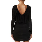 Saint Laurent black viscose cocktail dress displayed on a hanger, featuring a sleek, fitted silhouette with elegant design details.