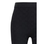 Gucci black viscose leggings with a smooth, fitted design and subtle sheen, styled on a model.