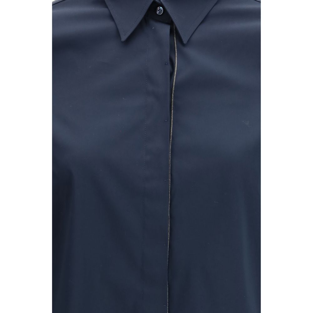 Brunello Cucinelli blue cotton dress shirt displayed on a hanger, showcasing its classic design and high-quality fabric.