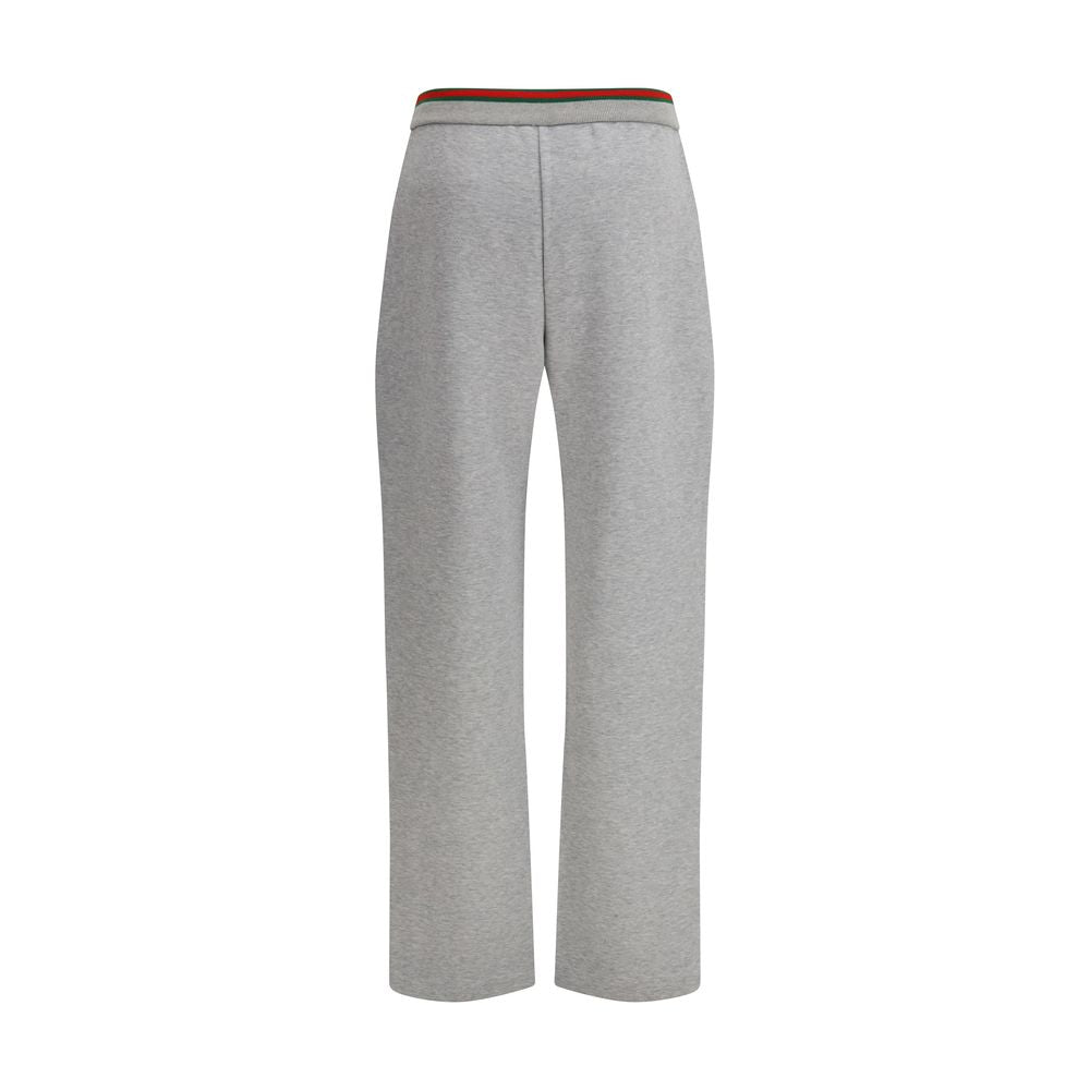Gray Gucci cotton casual pants displayed on a hanger, featuring a relaxed fit and subtle branding details.