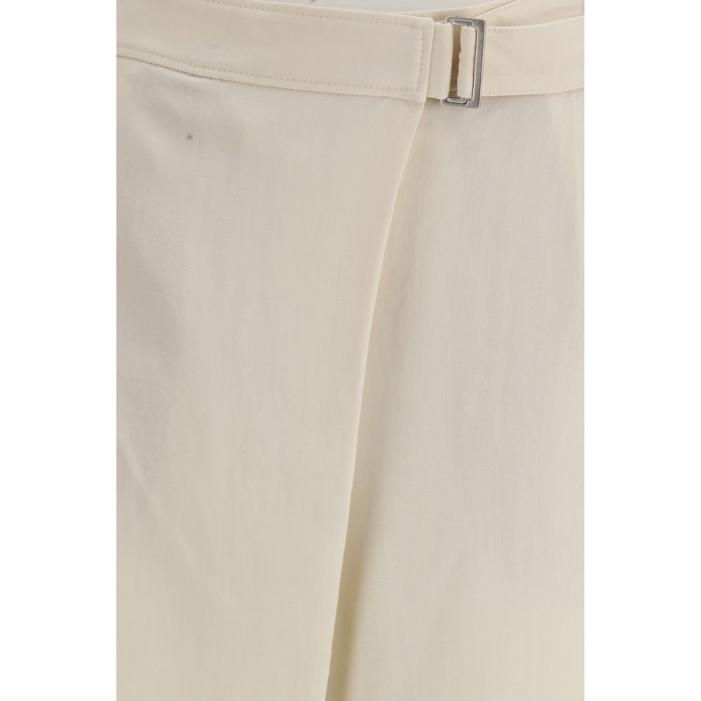 Beige Brunello Cucinelli viscose casual pants with relaxed fit and subtle tailoring, shown on a model.