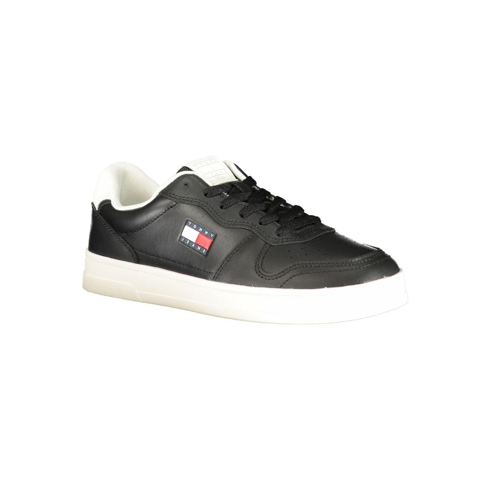 Tommy Hilfiger black polyurethane women's sneaker with white sole and stylish design, showcasing casual athletic footwear.