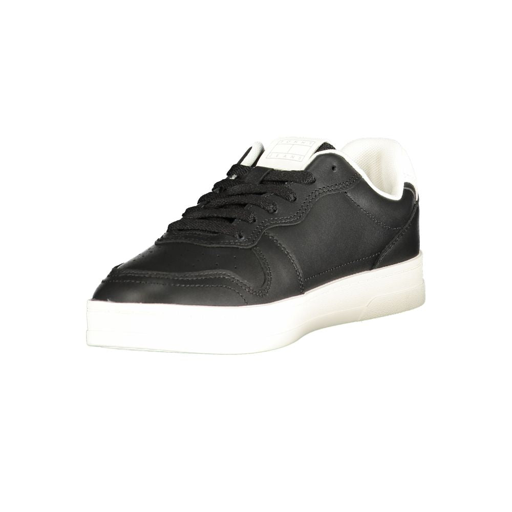 Black Tommy Hilfiger women's sneaker with polyurethane upper, stylish design, and casual athletic look.