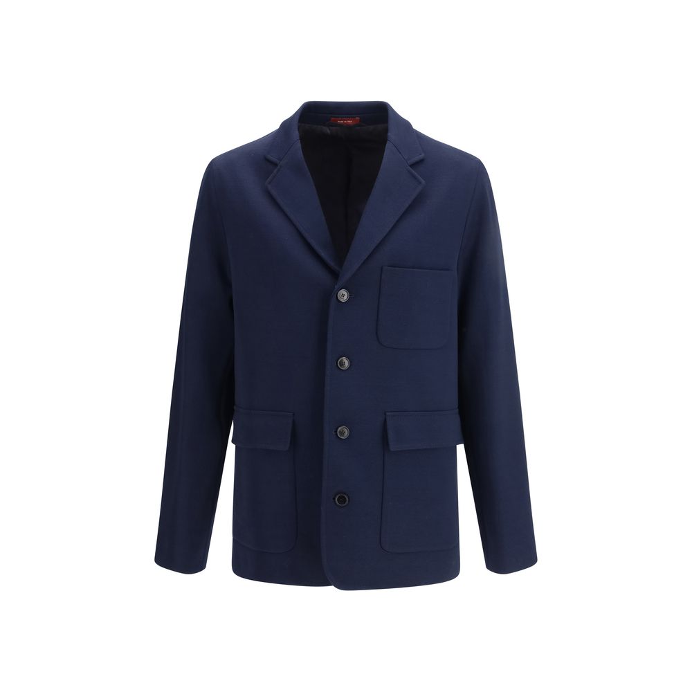Gucci blue cotton full-length jacket hanging on a clothing rack, showcasing its stylish design and tailored fit.