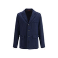 Gucci blue cotton full-length jacket hanging on a clothing rack, showcasing its stylish design and tailored fit.