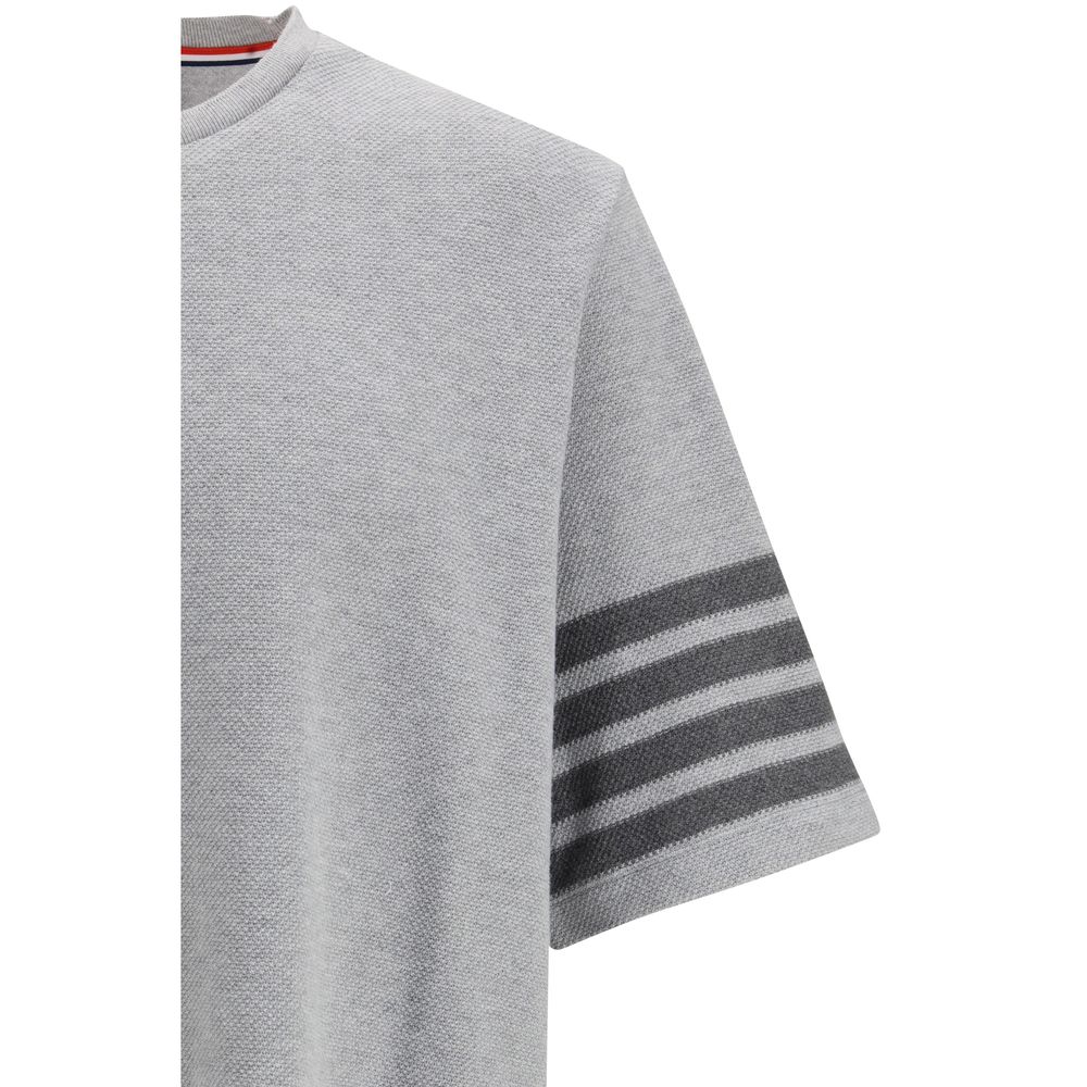 Thom Browne gray cotton sportswear featuring a comfortable, casual fit with classic design elements and subtle branding.