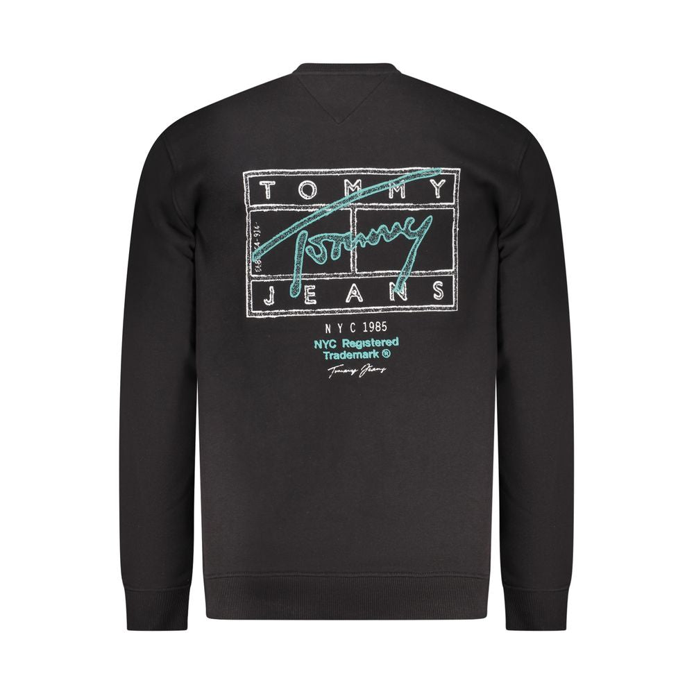 Black cotton men's sweatshirt by Tommy Hilfiger featuring a crew neck and logo detail, displayed on a model.
