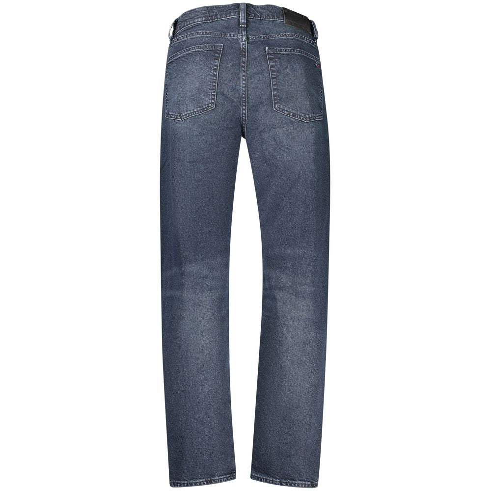 Tommy Hilfiger men's blue cotton jeans, classic fit with five-pocket design and belt loops, displayed on a plain background.