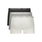 Tommy Hilfiger grey cotton men's boxer shorts laid flat, showing soft fabric and classic waistband with logo.