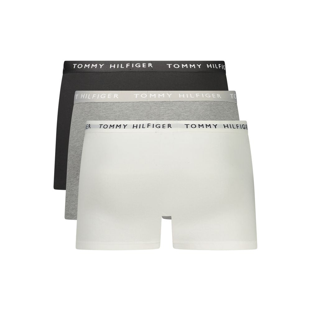 Tommy Hilfiger grey cotton men's boxer shorts laid flat, showing soft fabric and classic waistband with logo.