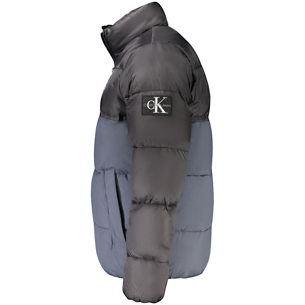 Calvin Klein blue polyester men's jacket displayed on a hanger with a full front view and casual styling.
