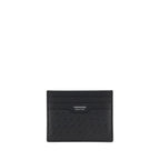Black calf leather Ferragamo Bos Taurus wallet with structured design and subtle branding, showcasing its elegant craftsmanship.