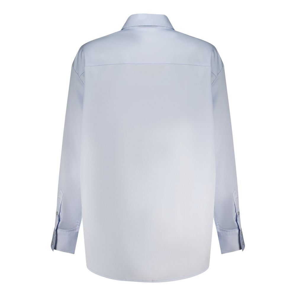 Guess Jeans blue cotton women’s shirt with a classic fit and button-up front, showcasing a casual and stylish design.
