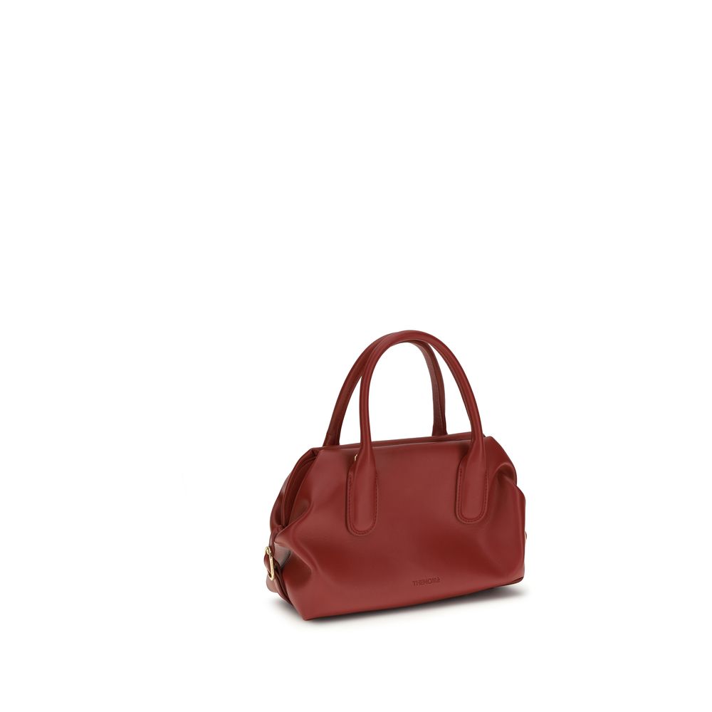THEMOIRè Red Handbag made from other fibres, showcasing a stylish, textured design with a structured shape and attention to detail.