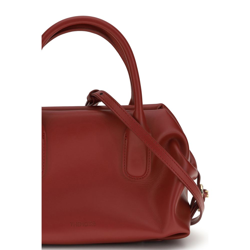 Red THEMOIRè handbag made from other fibres with a sleek design and structured shape, featuring top handles and subtle branding.