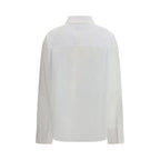 White cotton dress shirt by Loulou De Saison featuring a classic collar and button-down front on a model.