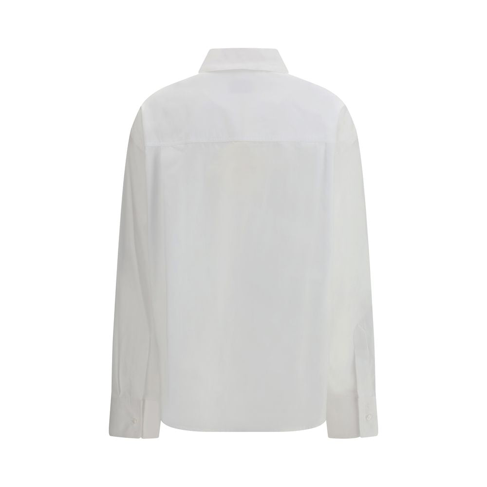 White cotton dress shirt by Loulou De Saison featuring a classic collar and button-down front on a model.