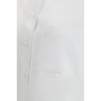 Loulou De Saison white cotton dress shirt with classic collar and button-front, neatly folded for display.