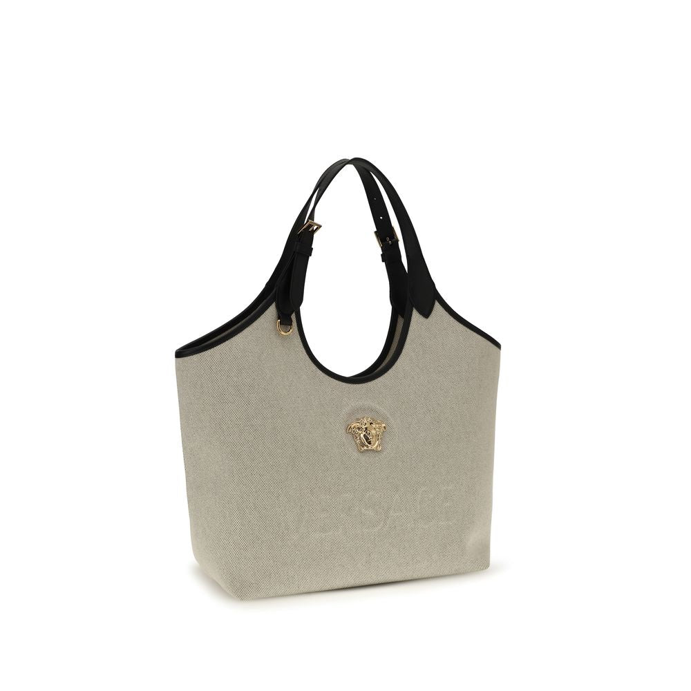 Versace beige cotton shoulder bag with stylish design and shoulder strap, featuring the luxury brand's signature details.