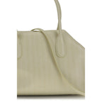 Beige THEMOIRè polyethylene shoulder bag with sleek design and shoulder strap, perfect for stylish everyday use.