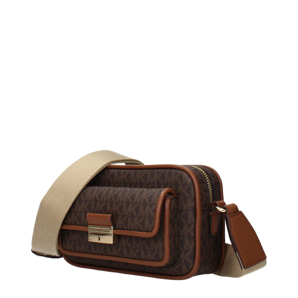 Michael Kors brown fabric crossbody bag with adjustable strap and gold-tone hardware, detailed view of the bag's texture and design.