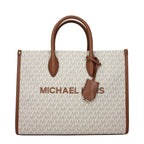 Michael Kors beige fabric handbag with structured design and top handles, featuring subtle branding and elegant stitching details.