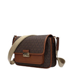 Michael Kors brown fabric crossbody bag with adjustable strap and gold-tone hardware, stylish accessory for everyday use.