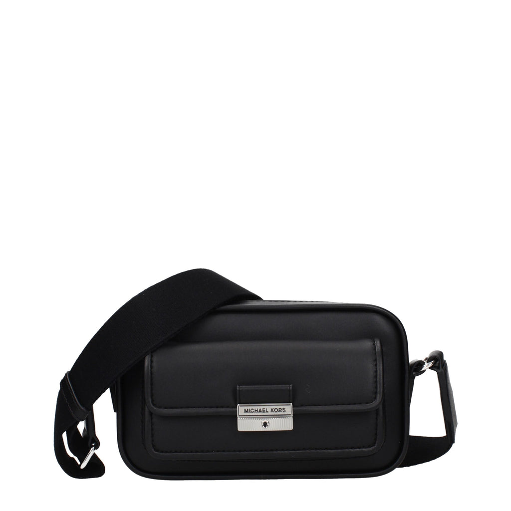 Michael Kors black leather crossbody bag with adjustable strap and gold-tone hardware, stylish accessory for everyday use.