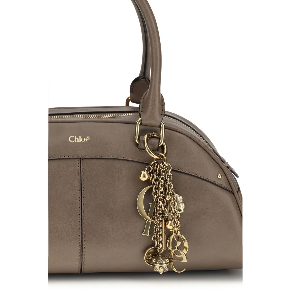 Chloé gray calf leather Bos Taurus handbag with gold-tone hardware and structured design, featuring top handles and a sleek finish.