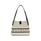 Balmain beige cotton shoulder bag with stylish design and shoulder strap, perfect for casual and chic outfits.