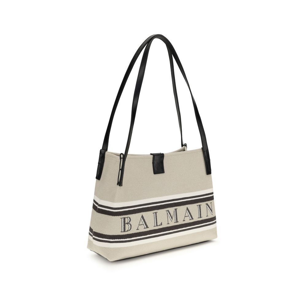Balmain beige cotton shoulder bag with stylish design, featuring a sleek strap and minimalist look.