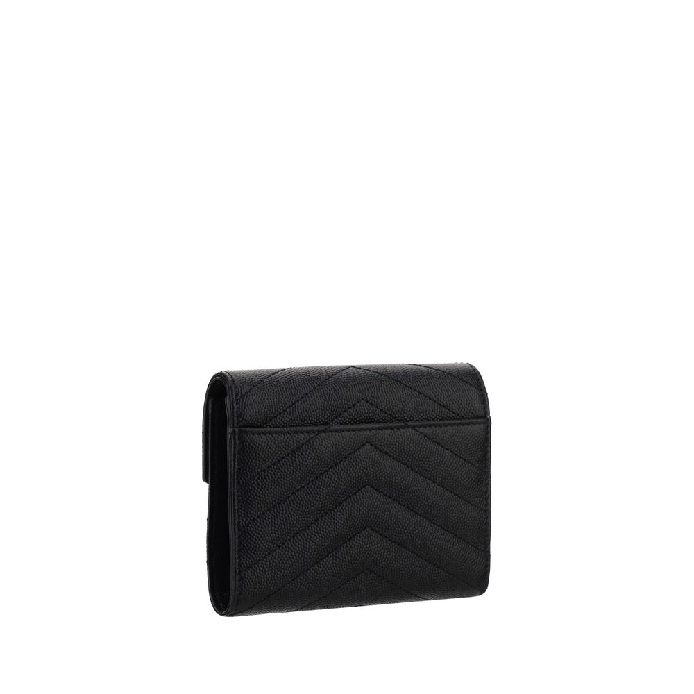 Saint Laurent black calf leather Bos Taurus wallet with sleek design and subtle logo details.