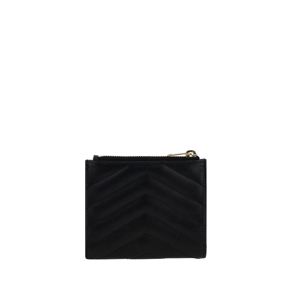 Saint Laurent Bos Taurus wallet in black calf leather with sleek design and signature details.