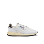 Autry white leather athletic sneakers with laces and cushioned soles, designed for comfortable casual wear.