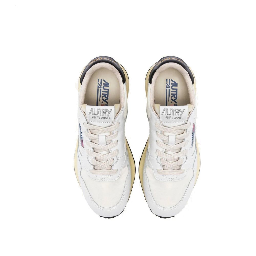 Autry white leather athletic sneakers with cushioned soles and stylish design, perfect for casual sportswear.