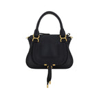 Chloé Bos Taurus handbag made of black calf leather with sleek design and top handles, stylish accessory for everyday use.