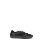 Prada black polyester athletic sneakers with sleek design and sporty laces, ideal for casual and active wear.