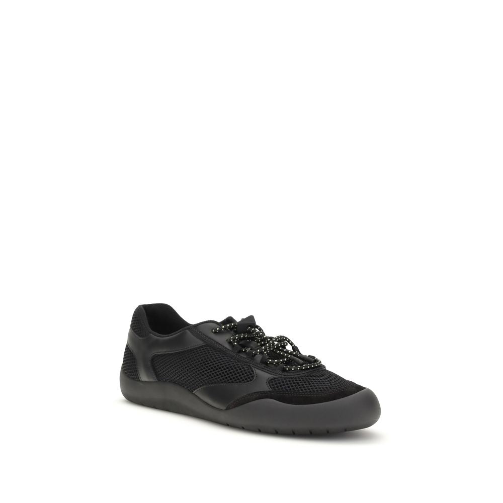 Prada black polyester athletic sneakers with sleek design, laces, and sporty sole, ideal for casual and athletic wear.
