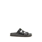 Valentino Garavani black calf leather Bos Taurus sandals with open toe and ankle strap, stylish and luxurious footwear.