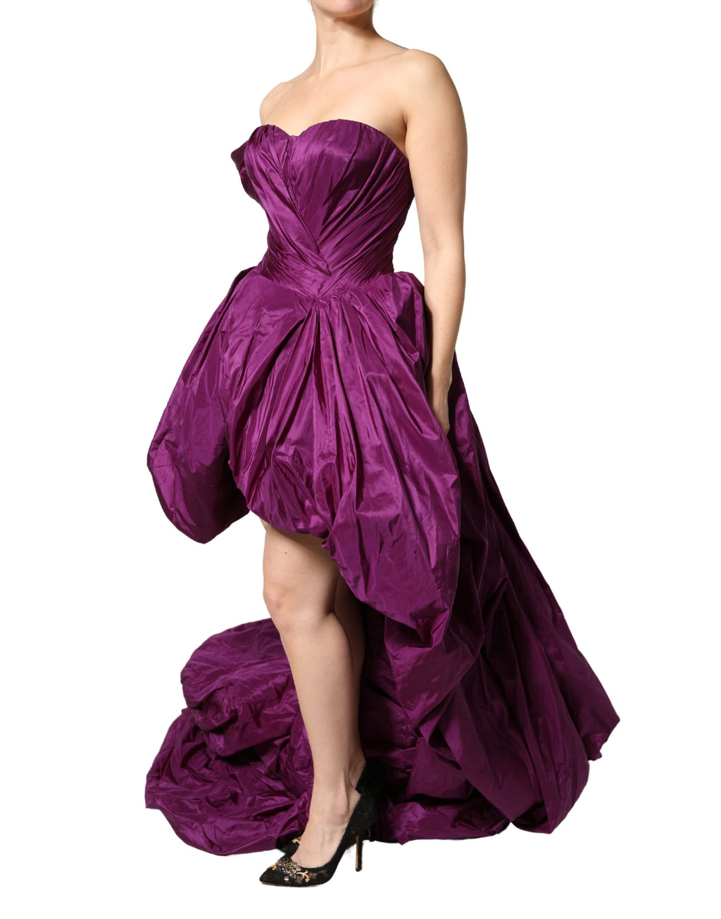 Purple Dolce & Gabbana strapless A-line dress with an asymmetric hem, flowing fabric, and elegant design.