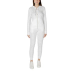 EA7 Emporio Armani cream polyester tracksuit laid flat, showing the full front view with logo details and smooth fabric texture.