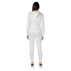 EA7 Emporio Armani cream polyester tracksuit laid flat, showing the full front with logo details and soft fabric texture.